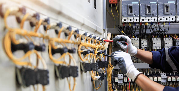 Professional Electrician technician working in Burnham, PA